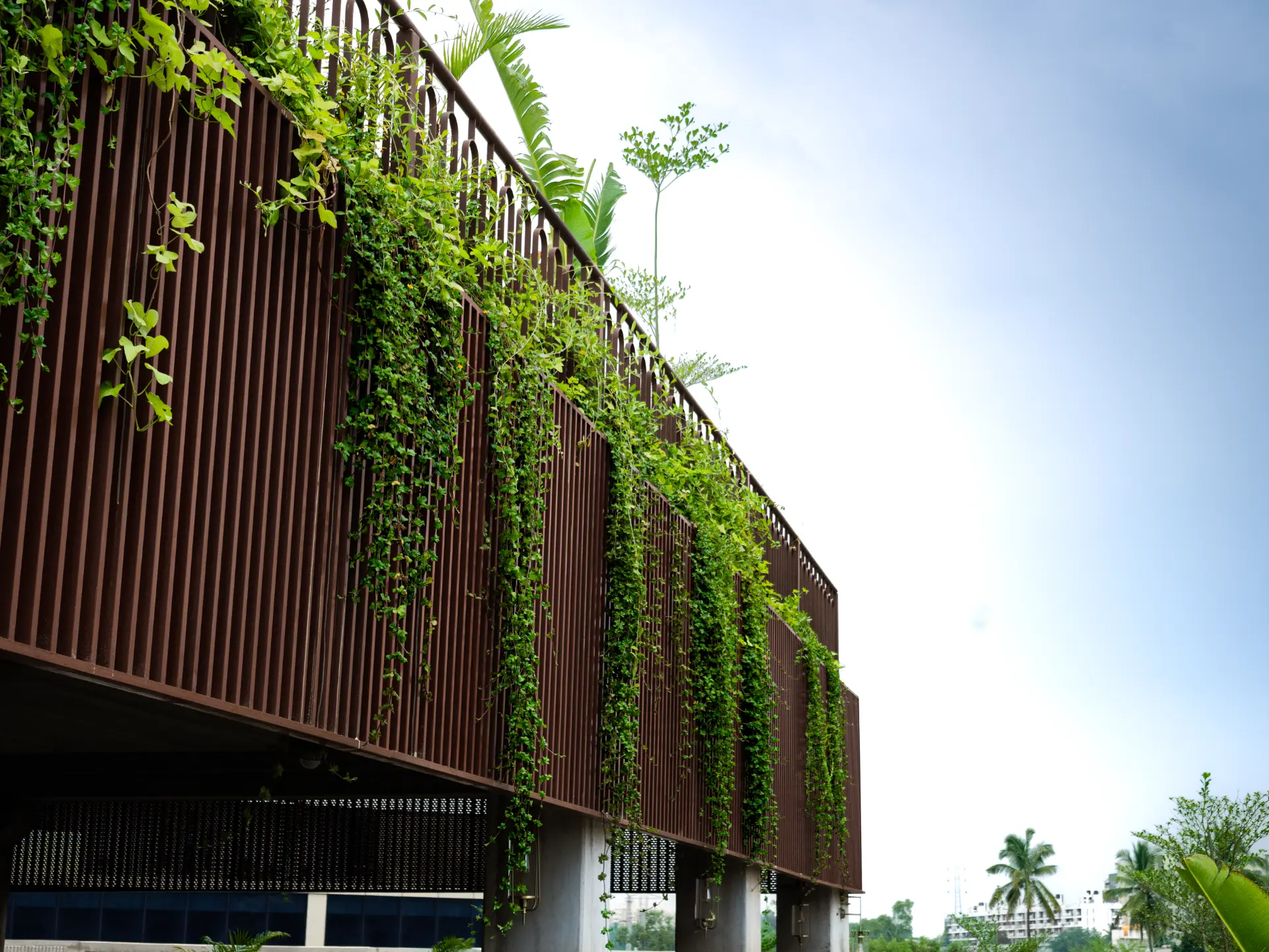 Weathering-steel screen with climbers
