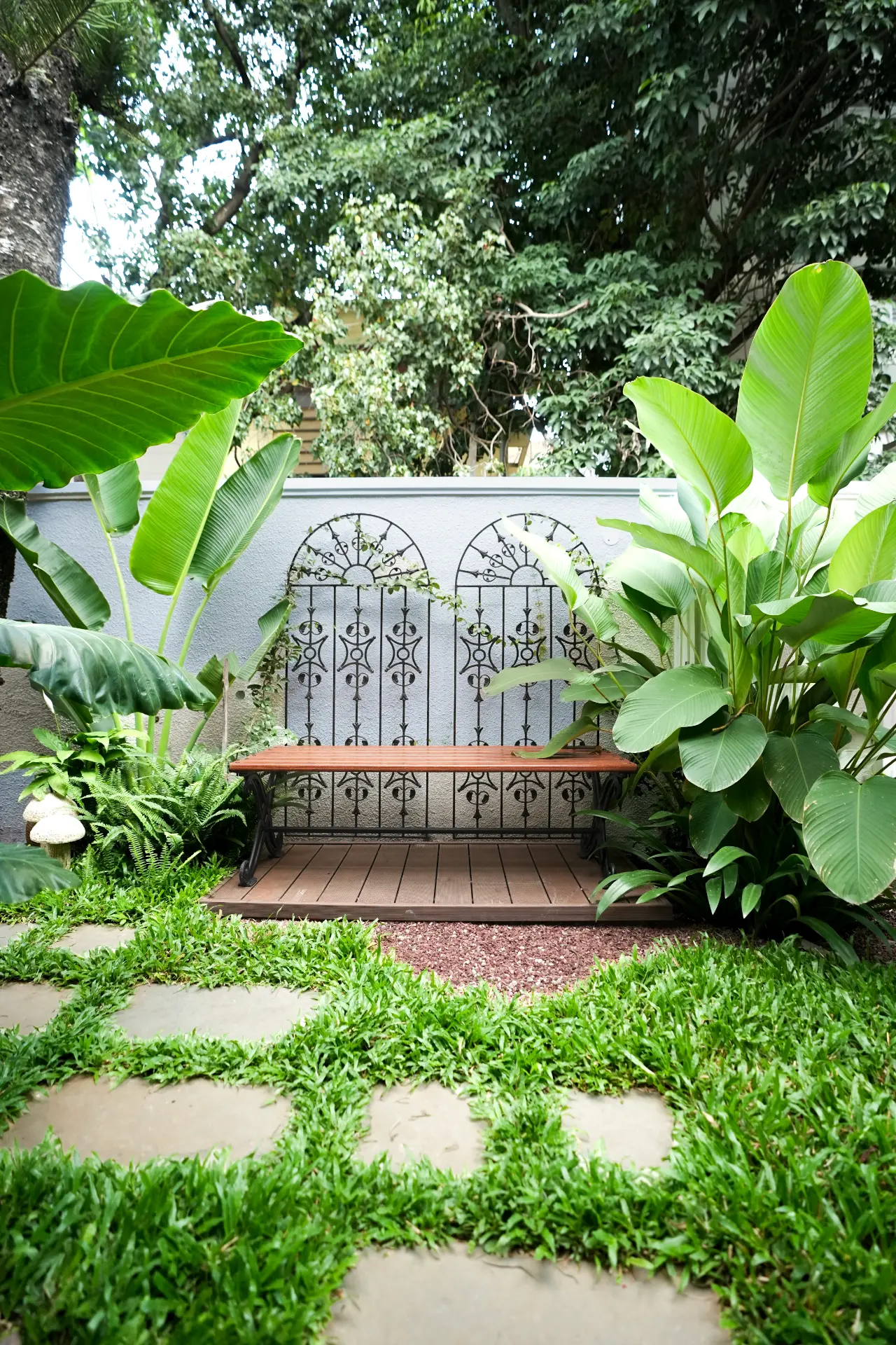 Bench beneath the wrought-iron screens